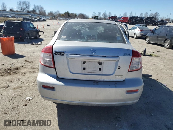 2011 Suzuki SX4 LE with VIN JS2YC5A27B6301040, listed as a Copart auction lot 47218805 with 106,474 mi miles and Salvage Title. Bid and sale history available at carsss.com. Image 6.