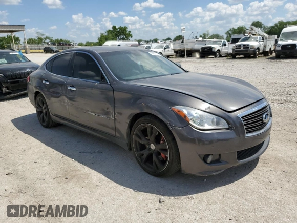2012 Infiniti M with VIN JN1BY1AP8CM335333, listed as a Copart auction lot 56885145 with 190,552 mi miles and Salvage title. Bid and sale history available at DreamBid. Image 4.