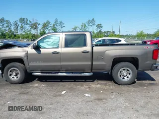 2014 Chevrolet Silverado 1500 Work Truck with VIN 3GCUKPEH0EG262607, listed as a IAAI auction lot 42028522 with 147,379 mi miles and . Bid and sale history available at DreamBid. Image 14.