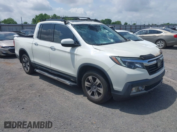 2019 Honda Ridgeline RTL-E with VIN 5FPYK3F77KB021667, listed as a IAAI auction lot 42115019 with 87,221 mi miles and . Bid and sale history available at DreamBid. Image 1.