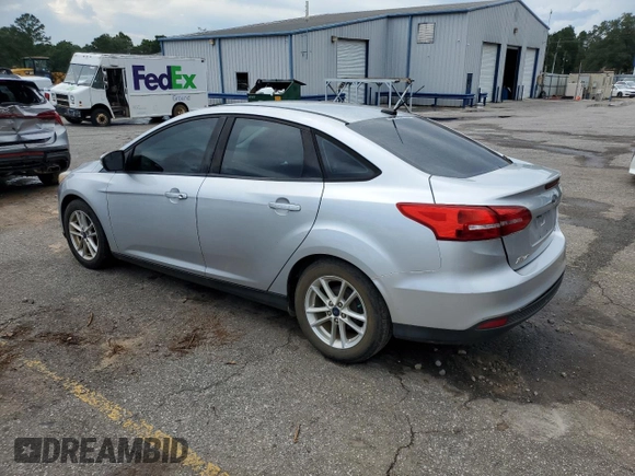 2017 Ford Focus SE with VIN 1FADP3F29HL242325, listed as a Copart auction lot 61153555 with 136,666 mi miles and Salvage title. Bid and sale history available at DreamBid. Image 2.