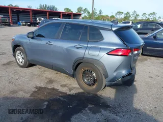 2023 Toyota Corolla Cross L with VIN 7MUAAAAG4PV044969, listed as a IAAI auction lot 42388727 with 26,071 mi miles and . Bid and sale history available at DreamBid. Image 3.