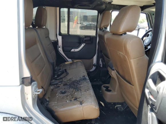 2011 Jeep Wrangler Unlimited Sahara with VIN 1J4BA5H14BL613895, listed as a Copart auction lot 65171404 with 0 mi miles and Non Repairable. Bid and sale history available at carsss.com. Image 11.
