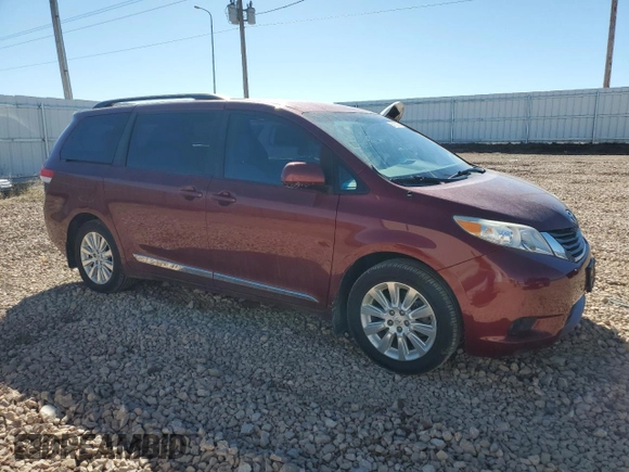 2014 Toyota Sienna LE with VIN 5TDJK3DC5ES075494, listed as a Copart auction lot 50102035 with 151,375 mi miles and Salvage Title. Bid and sale history available at DreamBid. Image 4.