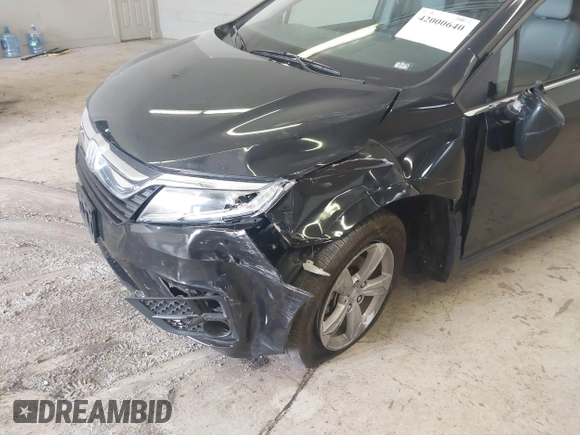2018 Honda Odyssey EX-L with VIN 5FNRL6H78JB011284, listed as a IAAI auction lot 42000640 with 154,252 mi miles and . Bid and sale history available at DreamBid. Image 6.