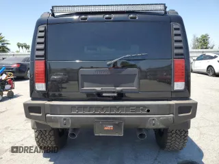 2005 Hummer H2 SUV z VIN 5GRGN23U05H117630, wystawiony jako Copart lot #57087305 z przebiegiem 60 260 mil mil oraz Szkoda całkowita • Salvage title. Historia ofert i sprzedaży dostępna na DreamBid. Obrazek 6.