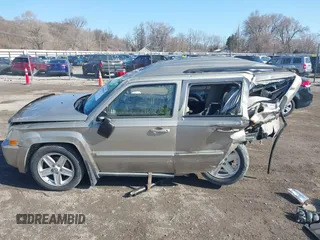 2010 Jeep Patriot Sport with VIN 1J4NF1GBXAD640562, listed as a IAAI auction lot 41869559 with 141,581 mi miles and . Bid and sale history available at DreamBid. Image 14.