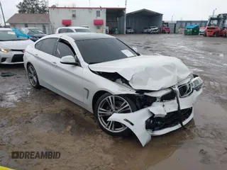 2016 BMW 4 Series 428i with VIN WBA4A9C50GGL87397, listed as a IAAI auction lot 41371517 with 140,278 mi miles. Bid and sale history available at carsss.com. Image 1.