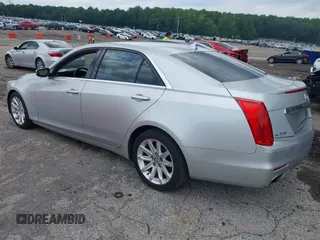2014 Cadillac CTS Luxury RWD z VIN 1G6AR5S38E0173628, wystawiony jako IAAI lot #42343647 z przebiegiem 166 035 mil mil oraz . Historia ofert i sprzedaży dostępna na DreamBid. Obrazek 3.