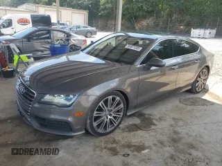 2013 Audi A7 Prestige с VIN WAU2GAFC8DN085624, выставлен на аукционе Copart как лот 63871205 с пробегом 178 800 миль миль и Списание • Salvage title. История ставок и продаж доступна на DreamBid. Изображение 1.