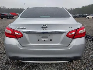 2017 Nissan Altima S z VIN 1N4AL3AP1HC115795, wystawiony jako IAAI lot #41523816 z przebiegiem 209 912 mil mil oraz . Historia ofert i sprzedaży dostępna na DreamBid. Obrazek 17.