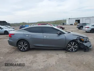2018 Nissan Maxima SV with VIN 1N4AA6AP4JC377985, listed as a IAAI auction lot 42071678 with 104,326 mi miles and . Bid and sale history available at DreamBid. Image 12.