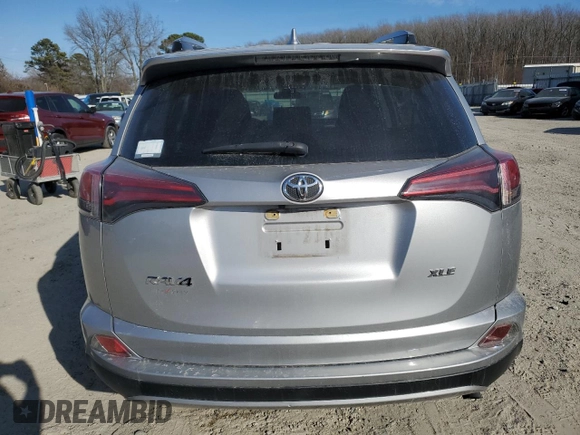 2018 Toyota RAV4 XLE with VIN JTMWFREV9JJ209010, listed as a Copart auction lot 46638075 with 50,553 mi miles and Salvage Title. Bid and sale history available at DreamBid. Image 6.