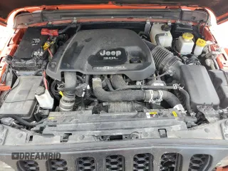 2023 Jeep Gladiator Rubicon FarOut z VIN 1C6JJTBM8PL587129, wystawiony jako Copart lot #53805935 z przebiegiem 46 790 mil mil oraz Szkoda całkowita • Salvage title. Historia ofert i sprzedaży dostępna na DreamBid. Obrazek 11.