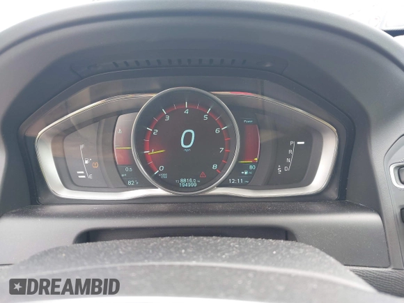 2015 Volvo XC60 T5 Drive-E Premier z VIN YV440MDB9F2622367, wystawiony jako IAAI lot #42356051 z przebiegiem 194 999 mil mil oraz . Historia ofert i sprzedaży dostępna na DreamBid. Obrazek 7.