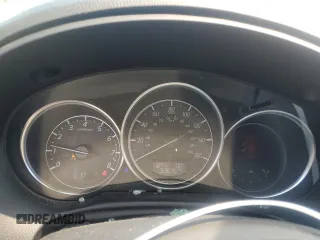 2016 Mazda CX-5 Grand Touring z VIN JM3KE4DY5G0741800, wystawiony jako Copart lot #58565455 z przebiegiem 33 675 mil mil oraz Szkoda całkowita • Salvage title. Historia ofert i sprzedaży dostępna na DreamBid. Obrazek 9.