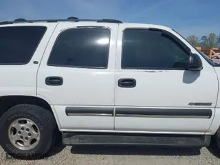 2002 Chevrolet Tahoe LS with VIN 1GNEC13V52J284059, listed as a IAAI auction lot 41899231 with 390,173 mi miles. Bid and sale history available at carsss.com. Image 13.