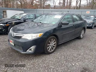 2014 Toyota Camry SE with VIN 4T1BK1FK6EU544726, listed as a IAAI auction lot 41630731 with 108,072 mi miles. Bid and sale history available at carsss.com. Image 2.