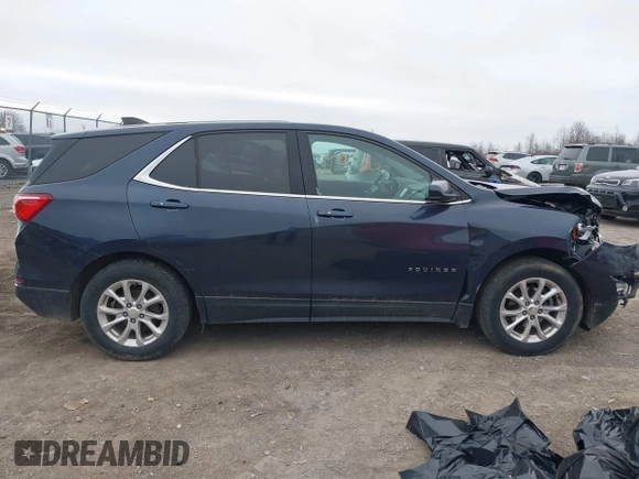 2018 Chevrolet Equinox LT with VIN 3GNAXJEV2JL293664, listed as a IAAI auction lot 41911923 with 105,057 mi miles and . Bid and sale history available at DreamBid. Image 14.