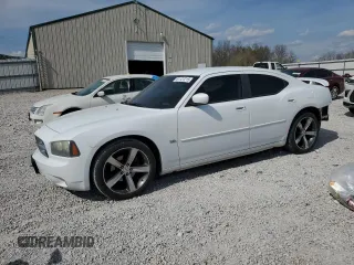 2010 Dodge Charger SXT with VIN 2B3CA3CV5AH259200, listed as a Copart auction lot 51127215 with 186,217 mi miles and Salvage Title. Bid and sale history available at carsss.com. Image 1.