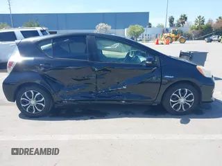 2012 Toyota Prius c One with VIN JTDKDTB36C1527223, listed as a IAAI auction lot 42002927 with 138,176 mi miles. Bid and sale history available at carsss.com. Image 13.