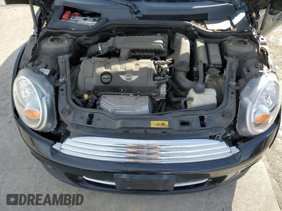 2012 MINI Hardtop with VIN WMWSU3C54CT255997, listed as a Copart auction lot 49162435 with 87,708 mi miles and Salvage Title. Bid and sale history available at DreamBid. Image 11.