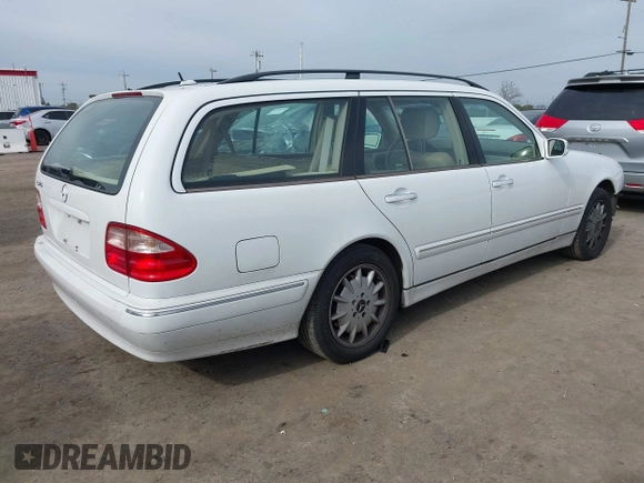 2001 Mercedes-Benz E-Class with VIN WDBJH65J31B364290, listed as a IAAI auction lot 41545677 with 162,040 mi miles. Bid and sale history available at carsss.com. Image 4.