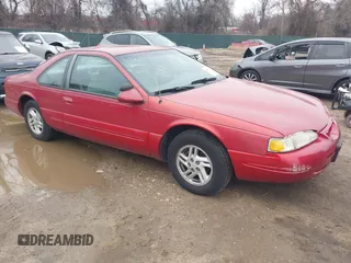1997 Ford Thunderbird LX with VIN 1FALP6248VH134894, listed as a IAAI auction lot 41551957 with 136,435 mi miles and . Bid and sale history available at DreamBid. Image 1.