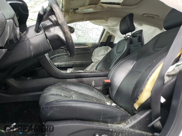 2017 Ford Fusion Titanium z VIN 3FA6P0K93HR227511, wystawiony jako Copart lot #60719505 z przebiegiem Nie podano mil oraz Szkoda całkowita • Salvage title. Historia ofert i sprzedaży dostępna na DreamBid. Obrazek 7.