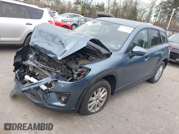 2015 Mazda CX-5 Touring with VIN JM3KE4CY1F0545305, listed as a IAAI auction lot 41234599 with 92,791 mi miles. Bid and sale history available at carsss.com. Image 19.