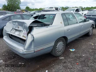 1998 Cadillac DeVille z VIN 1G6KD54Y7WU740871, wystawiony jako IAAI lot #42259686 z przebiegiem 124 542 mil mil oraz . Historia ofert i sprzedaży dostępna na DreamBid. Obrazek 4.