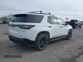 2018 Chevrolet Traverse Premier z VIN 1GNEVJKW0JJ229036, wystawiony jako IAAI lot #41866737 z przebiegiem 126 794 mil mil oraz . Historia ofert i sprzedaży dostępna na DreamBid. Obrazek 4.