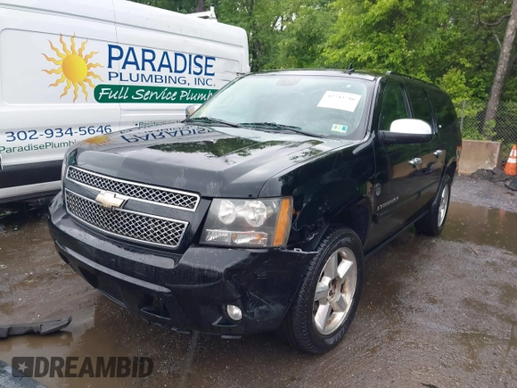 2008 Chevrolet Suburban LTZ with VIN 1GNFK16338J221195, listed as a IAAI auction lot 42243746 with 199,707 mi miles and . Bid and sale history available at DreamBid. Image 6.
