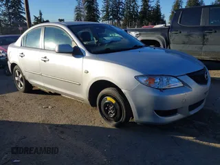2006 Mazda 3 i Touring with VIN JM1BK12F661522208, listed as a IAAI auction lot 41536978 with 147,522 mi miles and . Bid and sale history available at DreamBid. Image 1.