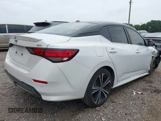 2020 Nissan Sentra SR z VIN 3N1AB8DV6LY241609, wystawiony jako IAAI lot #42255322 z przebiegiem 52 193 mil mil oraz . Historia ofert i sprzedaży dostępna na DreamBid. Obrazek 4.