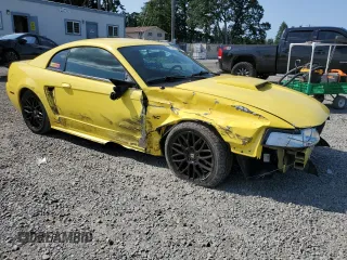 2002 Ford Mustang GT Deluxe with VIN 1FAFP42X72F136641, listed as a Copart auction lot 59294015 with 189,350 mi miles and Salvage title. Bid and sale history available at DreamBid. Image 4.