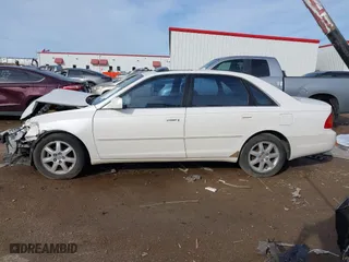 2000 Toyota Avalon XL with VIN 4T1BF28B3YU050271, listed as a IAAI auction lot 41668355 with 90,879 mi miles. Bid and sale history available at carsss.com. Image 15.