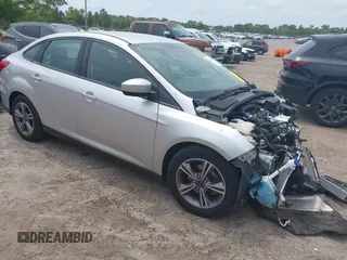 2018 Ford Focus SE with VIN 1FADP3FE4JL214013, listed as a IAAI auction lot 42180138 with 72,550 mi miles and . Bid and sale history available at DreamBid. Image 1.