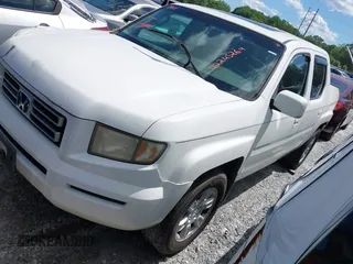 2006 Honda Ridgeline RTL z VIN 2HJYK16506H512654, wystawiony jako IAAI lot #42245264 z przebiegiem 303 551 mil mil oraz . Historia ofert i sprzedaży dostępna na DreamBid. Obrazek 2.