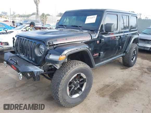 2020 Jeep Wrangler Unlimited Rubicon with VIN 1C4HJXFG1LW141335, listed as a IAAI auction lot 42724973 with 59,843 mi miles and . Bid and sale history available at DreamBid. Image 19.