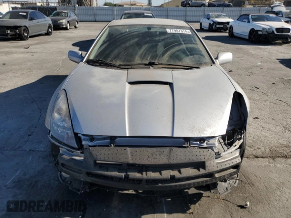 2003 Toyota Celica GT with VIN JTDDR32T130164099, listed as a Copart auction lot 77907374 with 73,950 mi miles and Salvage Title. Bid and sale history available at carsss.com. Image 5.