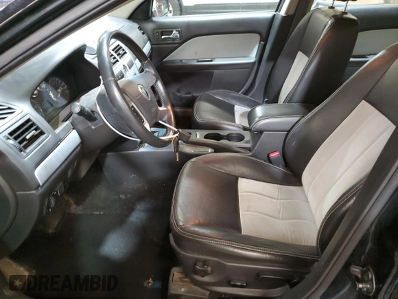2008 Mercury Milan with VIN 3MEHM07Z48R656532, listed as a Copart auction lot 52419735 with 129,613 mi miles and Salvage title. Bid and sale history available at DreamBid. Image 7.