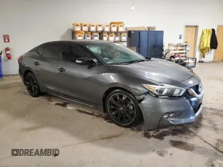 2017 Nissan Maxima SV with VIN 1N4AA6AP0HC383003, listed as a Copart auction lot 58060855 with 123,990 mi miles and Salvage title. Bid and sale history available at DreamBid. Image 4.
