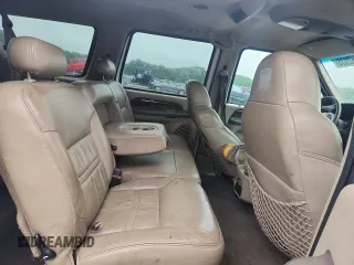 2000 Ford Excursion Limited z VIN 1FMNU42S3YED08967, wystawiony jako Copart lot #60062035 z przebiegiem 212 040 mil mil oraz Czysty tytuł • Clean title. Historia ofert i sprzedaży dostępna na DreamBid. Obrazek 11.