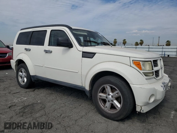 2010 Dodge Nitro SXT z VIN 1D4PT5GK8AW100343, wystawiony jako Copart lot #74628804 z przebiegiem 156 612 mil mil oraz Szkoda całkowita • Salvage title. Historia ofert i sprzedaży dostępna na DreamBid. Obrazek 4.