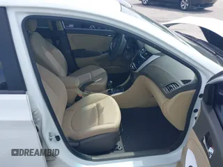 2014 Hyundai Accent GLS with VIN KMHCU4AE6EU766796, listed as a IAAI auction lot 41933743 with 99,142 mi miles. Bid and sale history available at carsss.com. Image 5.
