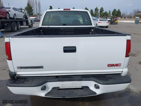 2003 GMC Sonoma SLS with VIN 1GTCS19X438272277, listed as a IAAI auction lot 41554041 with 168,682 mi miles. Bid and sale history available at carsss.com. Image 16.