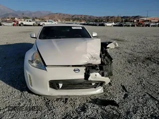 2014 Nissan 370Z Touring with VIN JN1AZ4EH7EM637101, listed as a Copart auction lot 41339705 with 105,841 mi miles and Salvage Title. Bid and sale history available at carsss.com. Image 11.
