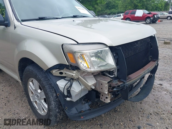 2010 Mercury Mariner with VIN 4M2CN8B73AKJ05123, listed as a IAAI auction lot 42512923 with 240,736 mi miles and . Bid and sale history available at DreamBid. Image 6.
