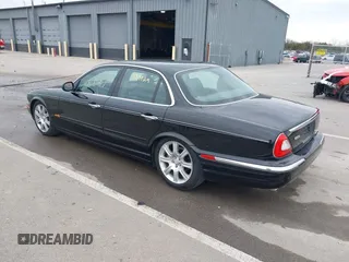 2004 Jaguar XJ with VIN SAJWA71C14SG20122, listed as a IAAI auction lot 41685767 with 113,392 mi miles. Bid and sale history available at carsss.com. Image 3.